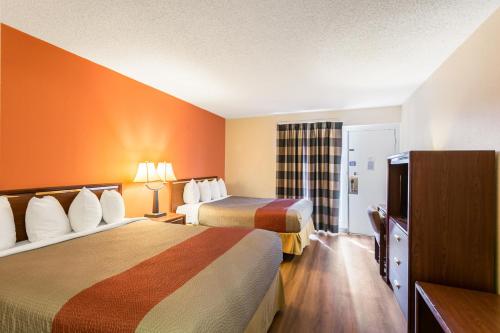 Ένα ή περισσότερα κρεβάτια σε δωμάτιο στο Motel 6-Butte, MT - Historic City Center