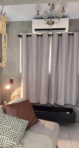 Cama o camas de una habitación en Recanto dos pássaros