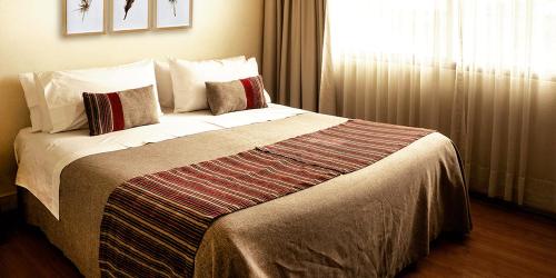 Katil atau katil-katil dalam bilik di HOTEL DACARLO