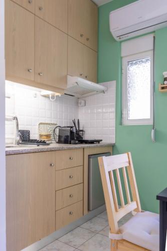 Кухня или мини-кухня в Zinnia Fully Equipped Apartment near City Centre
