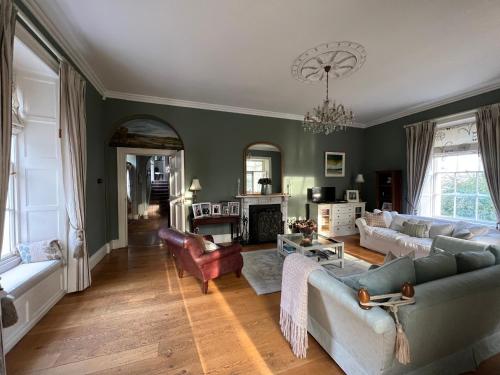 Ένα ή περισσότερα κρεβάτια σε δωμάτιο στο Larchmount House B&B