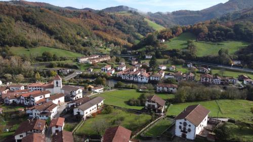 an aerial view of a village in the mountains at Olatuenea casa rural in Sumbilla