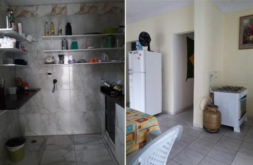 a kitchen with a white refrigerator in a room at hostel quintal da sereia in Salvador