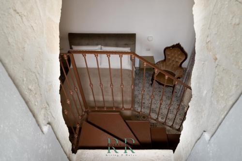 an overhead view of a staircase with a bunch of boxes at Rosa Rooms - Living & Relax - Family House in Bisceglie