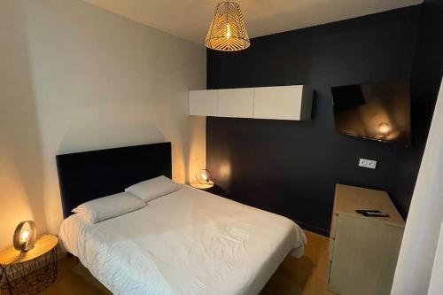Postel nebo postele na pokoji v ubytování 2 pièces au cœur d'Angers