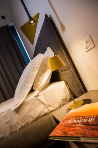 Ένα ή περισσότερα κρεβάτια σε δωμάτιο στο NINARY APARTMENTS a due passi dal centro storico