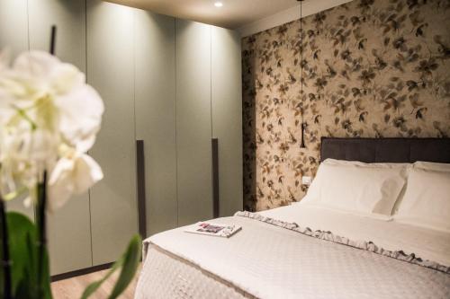 Ένα ή περισσότερα κρεβάτια σε δωμάτιο στο NINARY APARTMENTS a due passi dal centro storico
