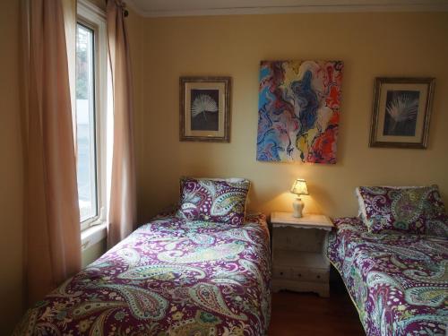 Postel nebo postele na pokoji v ubytování Woodside Inn