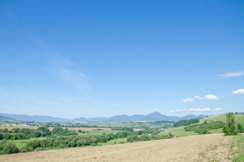 a view of the mountains from a hill at Drevenica JURsport Dúbrava in Dúbrava