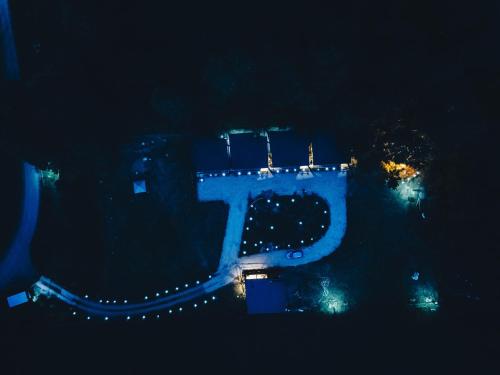 an aerial view of a city at night at Wincarayen Lodge & Cabañas in Panguipulli