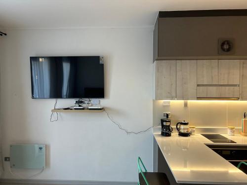Departamento Estudio, centricoにあるキッチンまたは簡易キッチン
