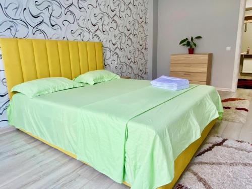 Ένα ή περισσότερα κρεβάτια σε δωμάτιο στο Apartament comfort Centru