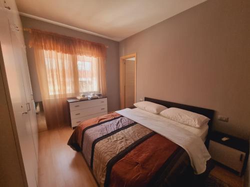 Postel nebo postele na pokoji v ubytování Orion Central Apartment