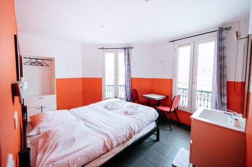 Ένα ή περισσότερα κρεβάτια σε δωμάτιο στο Hotel De La Poste