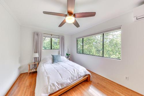 a bedroom with a bed and a ceiling fan at Princeville Condo with Private Sauna about 2 Mi to Beach in Princeville