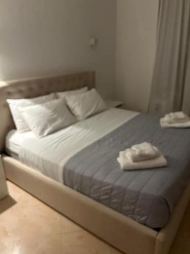 Postel nebo postele na pokoji v ubytování Manarola apartament