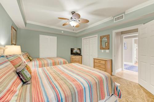 a bedroom with two beds and a ceiling fan at Majestic Sun 1205B in Destin