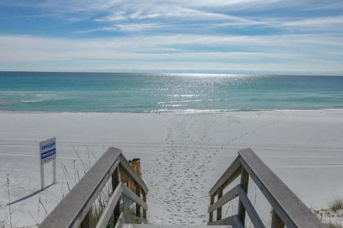 a view of the ocean from a balcony of a beach at Majestic Sun 1205B in Destin