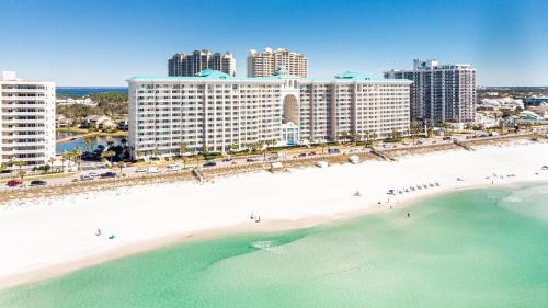 an aerial view of a beach in front of a city at Majestic Sun 1205B in Destin