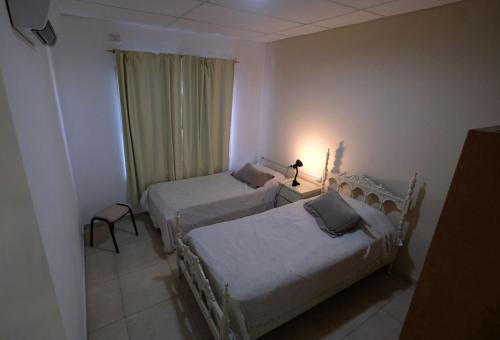 Postel nebo postele na pokoji v ubytování Amor de Finca