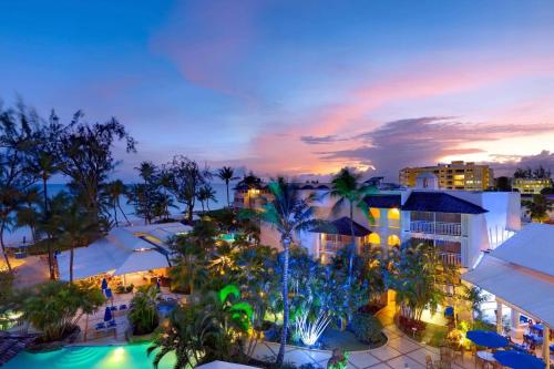 uma vista aérea de um resort à noite em Turtle Beach by Elegant Hotels - All Inclusive em Christ Church