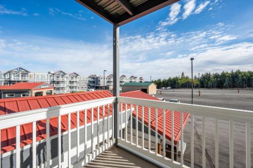 a balcony with a view of a parking lot at Stroll to Slopes, Village Area, Ski in-out MtLodge 219 in Snowshoe
