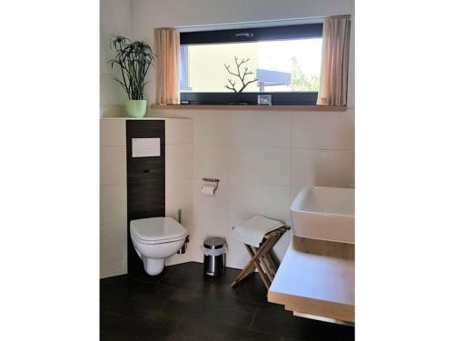 Ένα μπάνιο στο Gutsweg One - Apartment 3