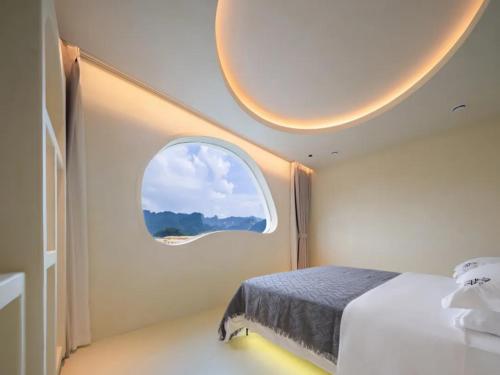 Cama o camas de una habitación en Wang Yun Residence Boutique Homestay