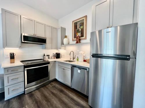 Una cocina o zona de cocina en The Hive 203 Sweeter