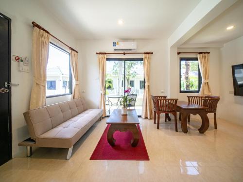 Posezení v ubytování Isara Nai Yang resort