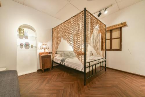 Letto o letti in una camera di Ohana House HQ