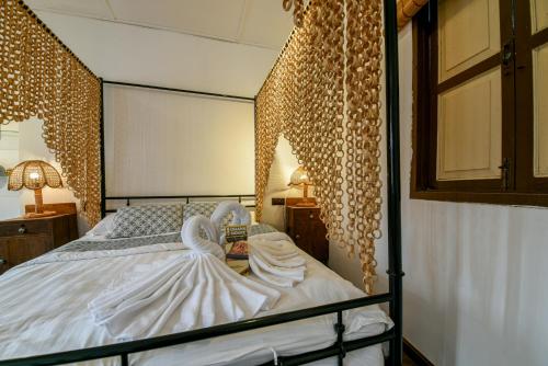Letto o letti in una camera di Ohana House HQ