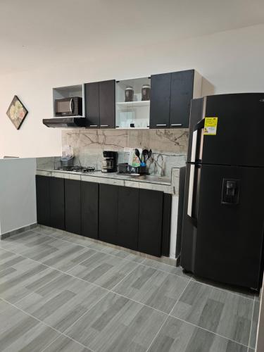 Kuchyň nebo kuchyňský kout v ubytování Zavara Hostal - Pueblo Tapao, 321-609-4407