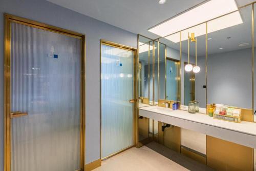 Kúpeľňa v ubytovaní Hanting Hotel Nanchang Bayiguan Metro Station