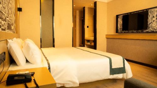 Katil atau katil-katil dalam bilik di City Comfort Inn Kashi Banchao Ancient City