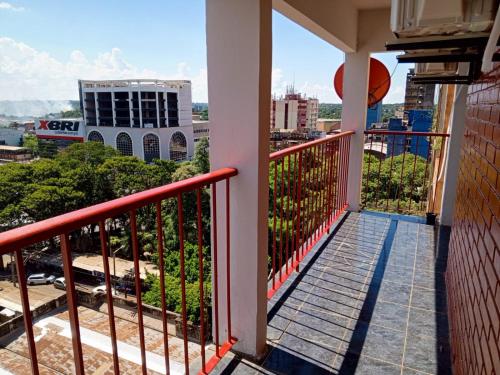 a balcony with a view of a city at AMANDA in Ciudad del Este