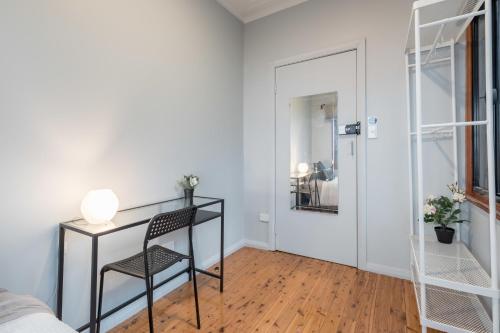 a bedroom with a desk and a chair in a room at 1 Private Single Room in Carramar 1-Minute Walk To Station - ROOM ONLY in Sydney