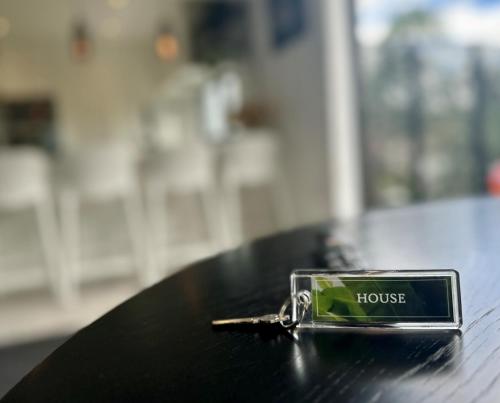 a bottle opener sitting on top of a table at Orewa Beachcomber in Orewa