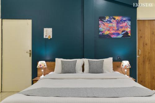 Cama o camas de una habitación en EKOSTAY- Deltin Villa