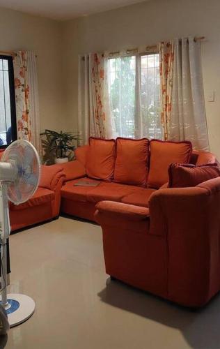 A seating area at Comfy & spacious home in Kabankalan City