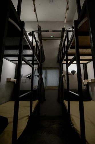 Μία ή περισσότερες κουκέτες σε δωμάτιο στο 綠島寧靜海自潛旅宿 TwinkleOcean Freediving Hostel