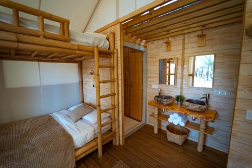 Postel nebo postele na pokoji v ubytování Kampaoh Costa Dorada