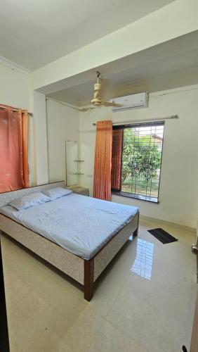 En eller flere senge i et værelse på Om Nanaai Villa