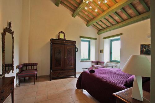Ένα ή περισσότερα κρεβάτια σε δωμάτιο στο Casale Vigneto