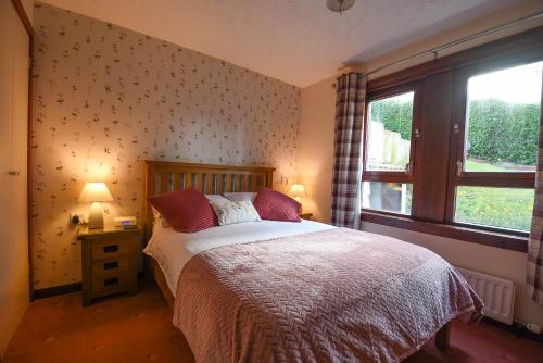 Ένα ή περισσότερα κρεβάτια σε δωμάτιο στο Balcarres Self Catering