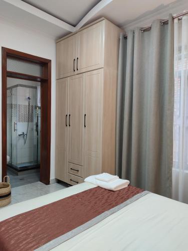 Ένα ή περισσότερα κρεβάτια σε δωμάτιο στο Wepick Homes