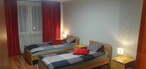 Postel nebo postele na pokoji v ubytování Apartament Sosnowiec