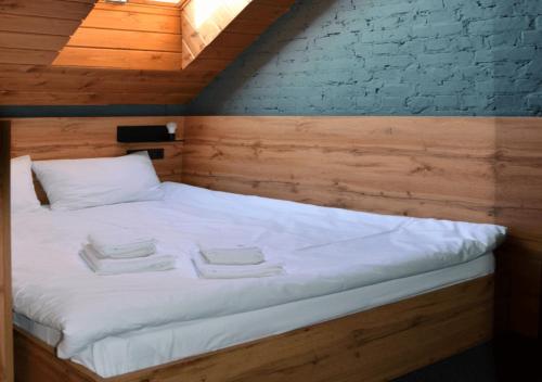 Postel nebo postele na pokoji v ubytování Baza Smart Hotel