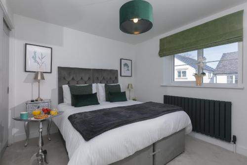 Una cama o camas en una habitación de Abelia