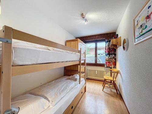 Palanda nebo palandy na pokoji v ubytování Apartment Mondzeu D034